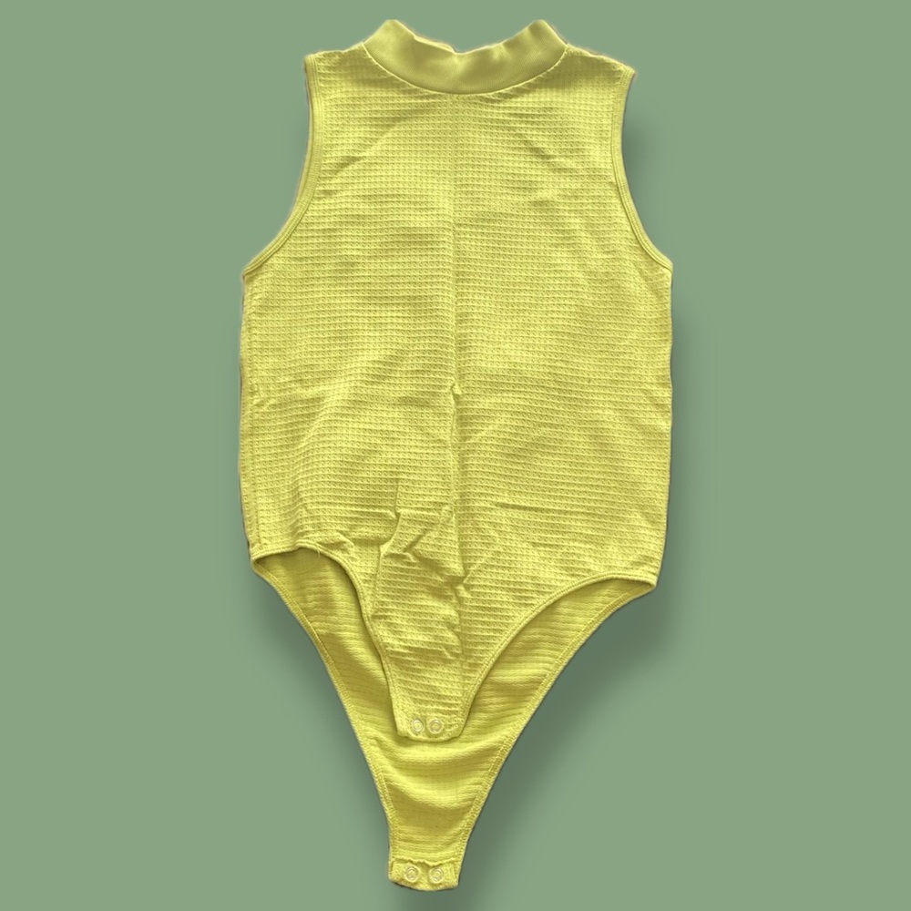 Lime green sleeveless turtleneck bodysuit